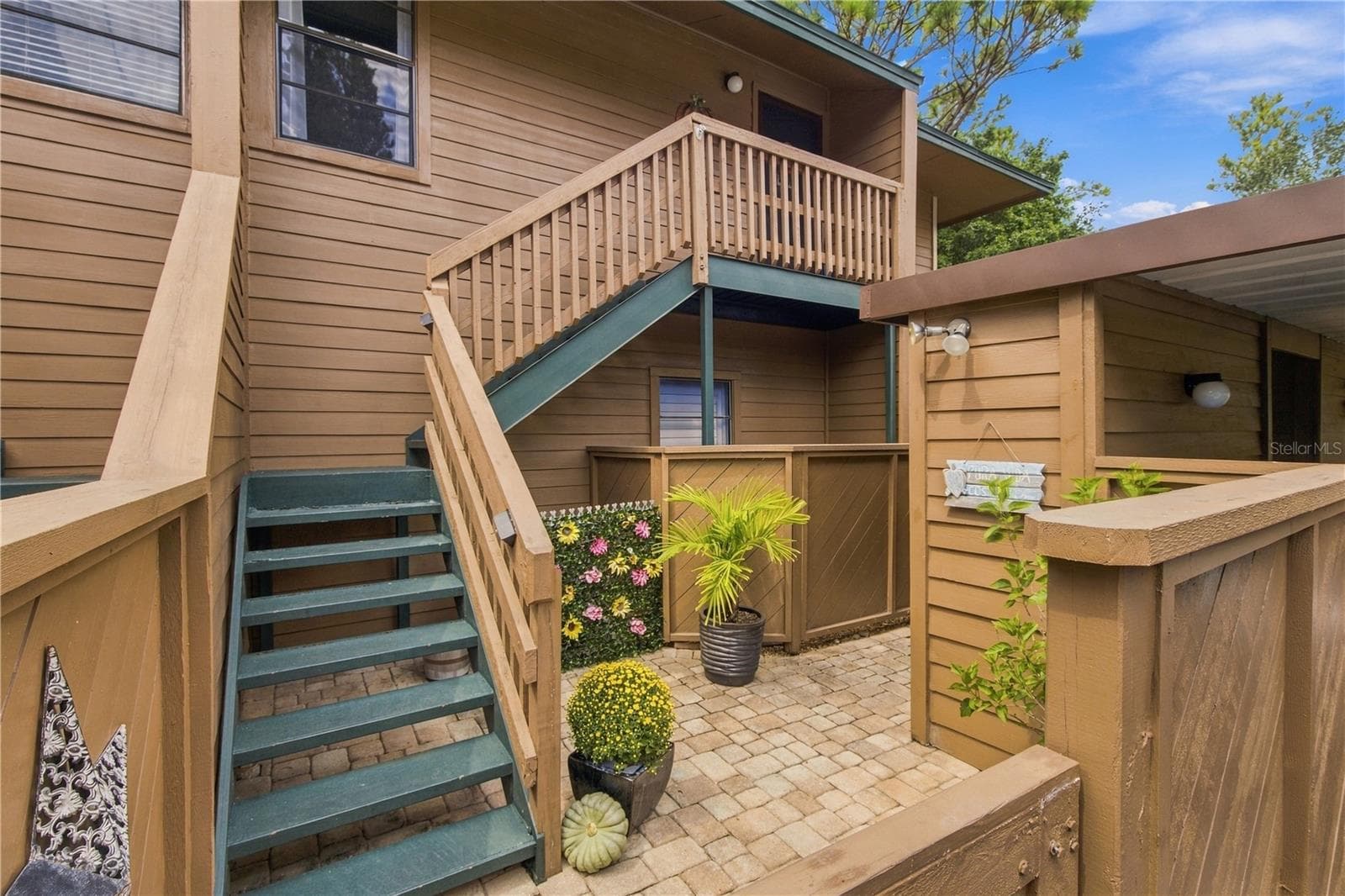 Stairway to 2nd floor unit - 1006 LENNOX RD W #1006, PALM HARBOR
