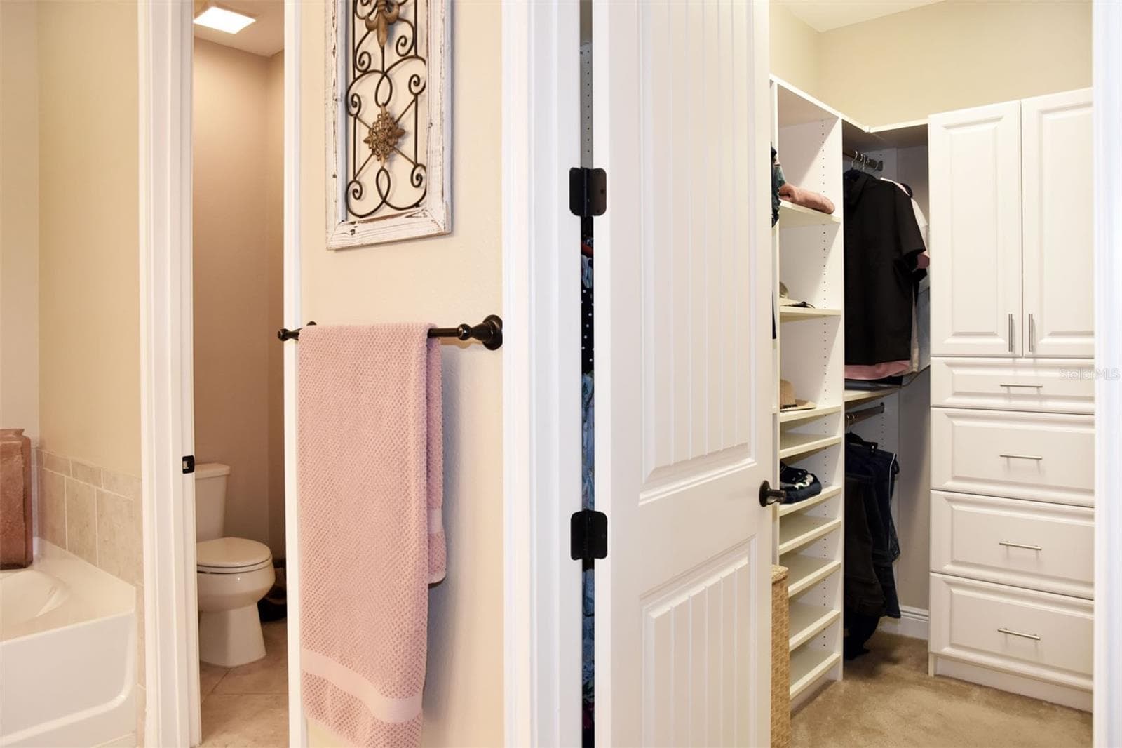 Primary closet/bath - 5233 BLOSSOM CV, BRADENTON