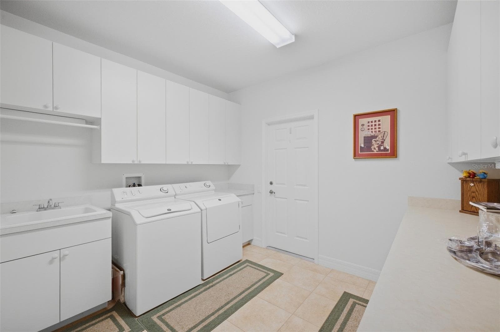 Laundry room leading to the garage - 1150 ROMANO KEY CIR, PUNTA GORDA
