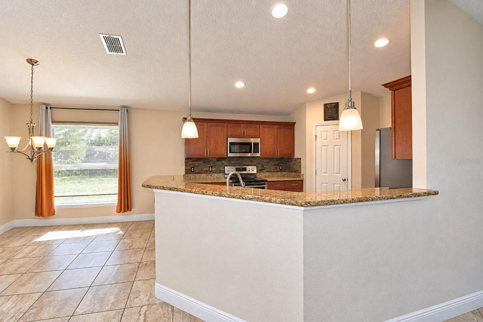 Single Family Residence at 2128 ORCHID WAY, POINCIANA, photo 6 of 46