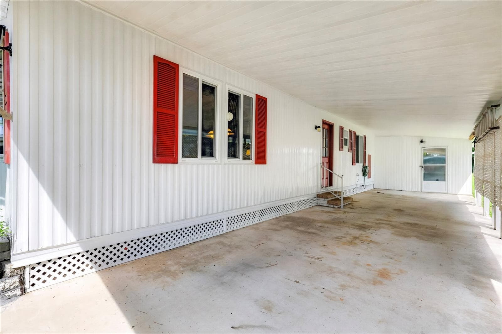 2 Car Covered Car-Port - 210 PALM MEADOWS DR, EUSTIS