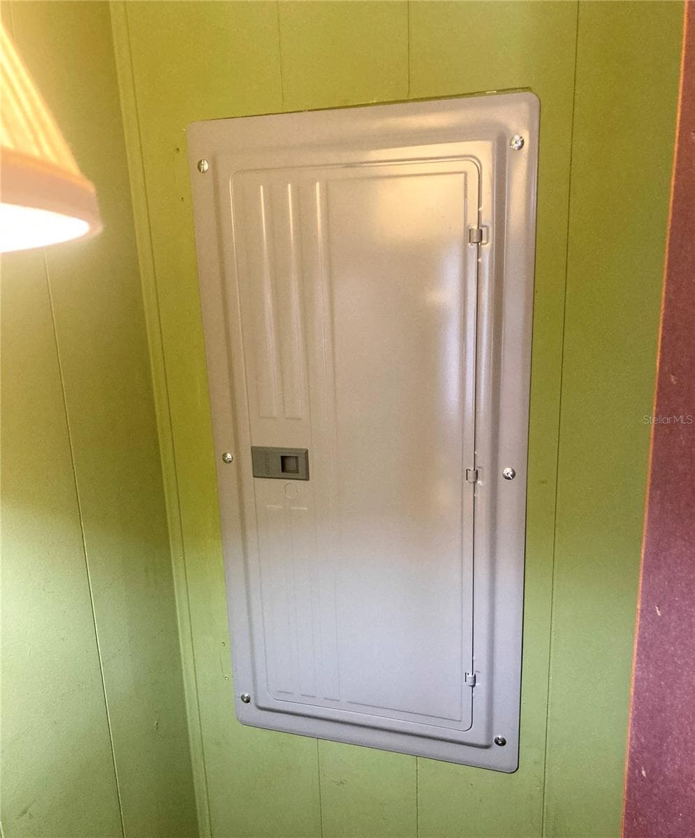 Panel is in Bedroom - 210 PALM MEADOWS DR, EUSTIS