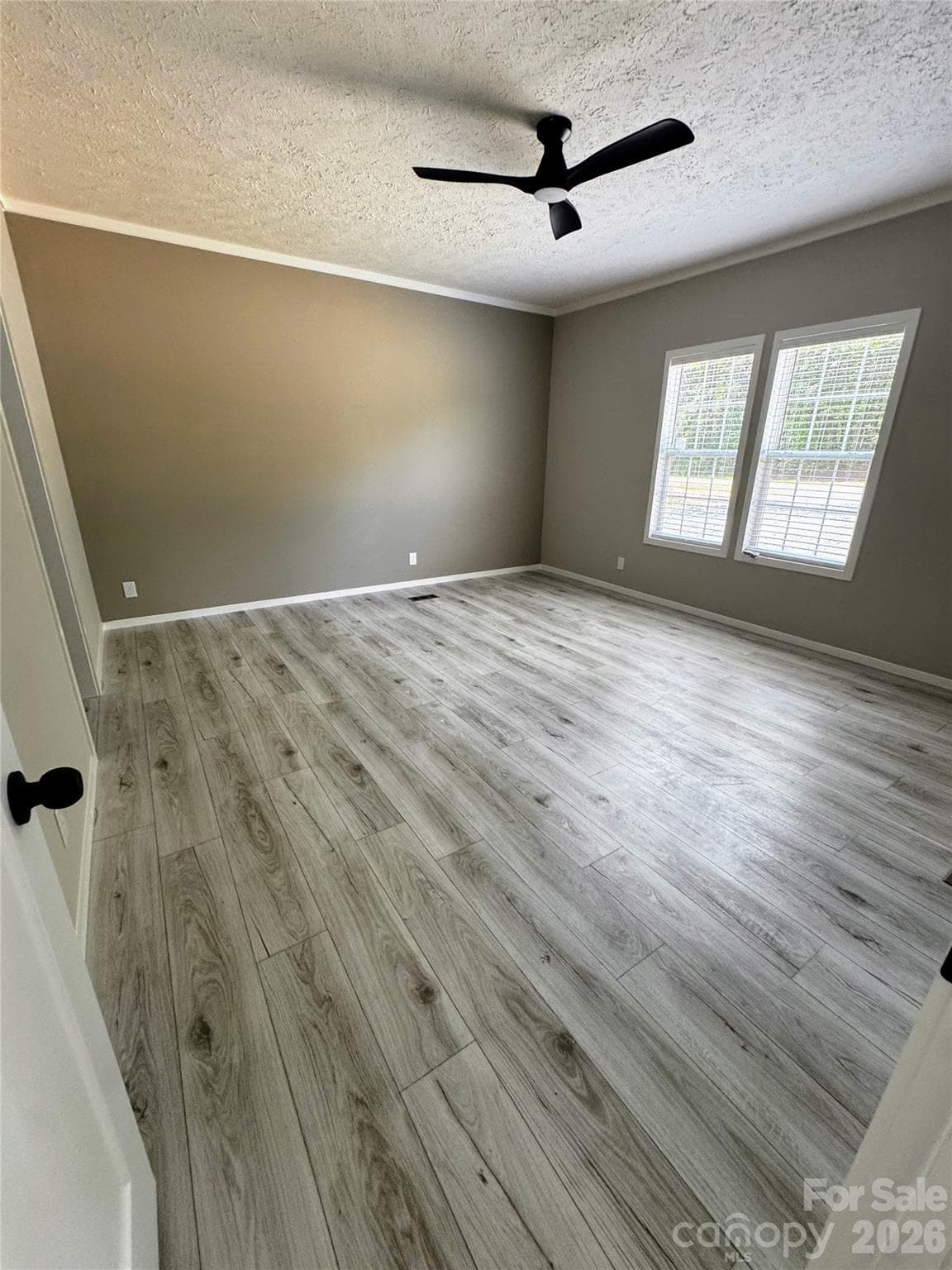 primary bedroom w/ceiling fan - 105 Cottontail Lane, Statesville
