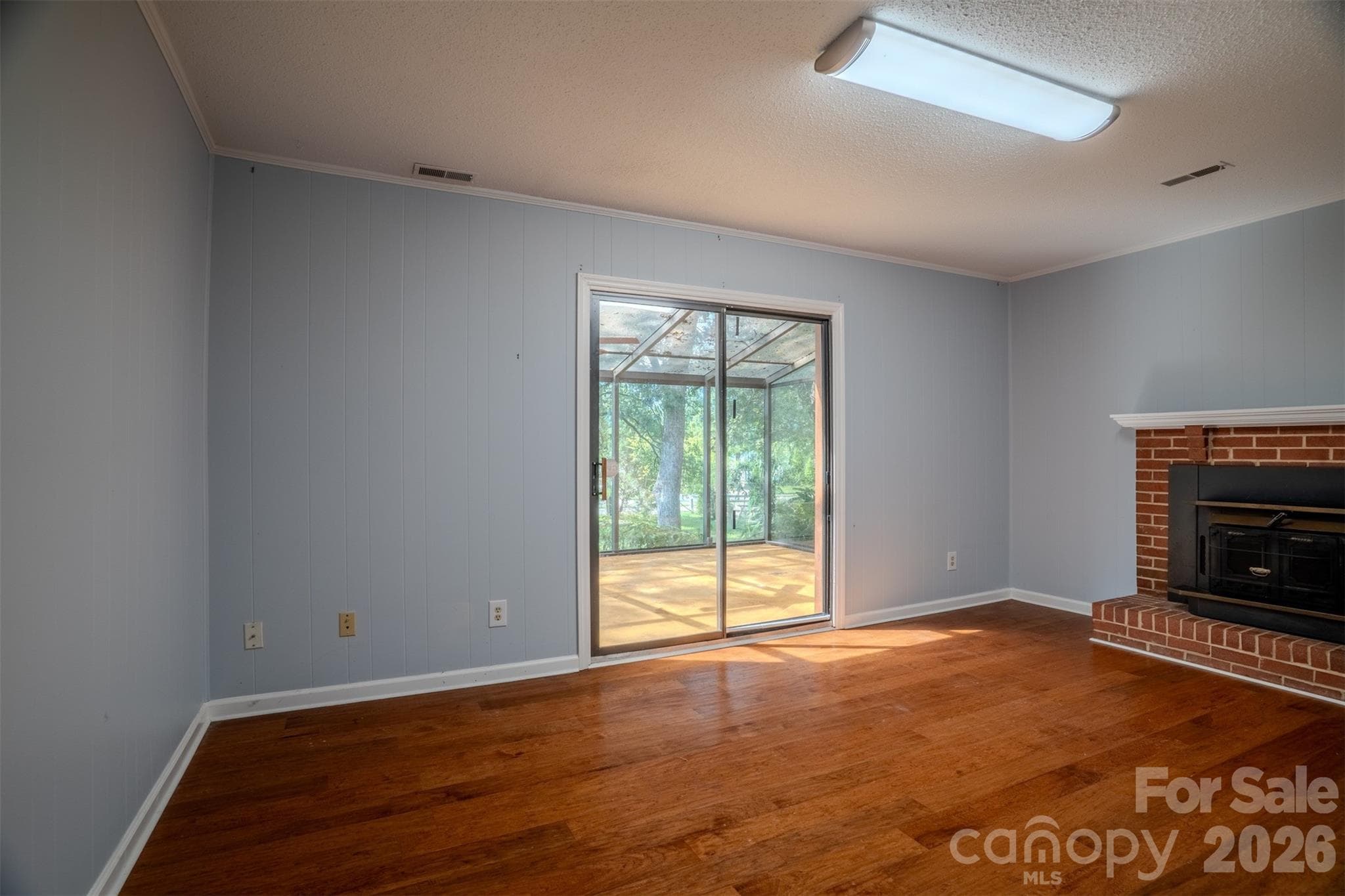 Den with Wood Stove - 6516 Brynwood Drive, Charlotte