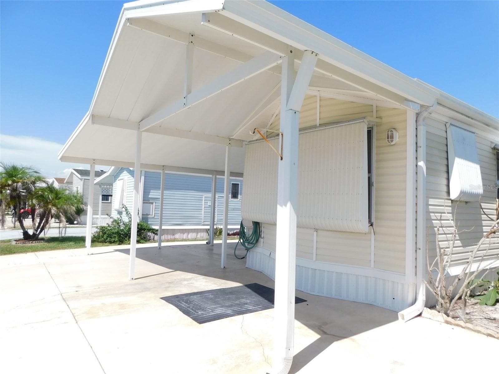 Manufactured Home at 7739 BLUFF BLVD #121, ZOLFO SPRINGS, photo 2 of 32