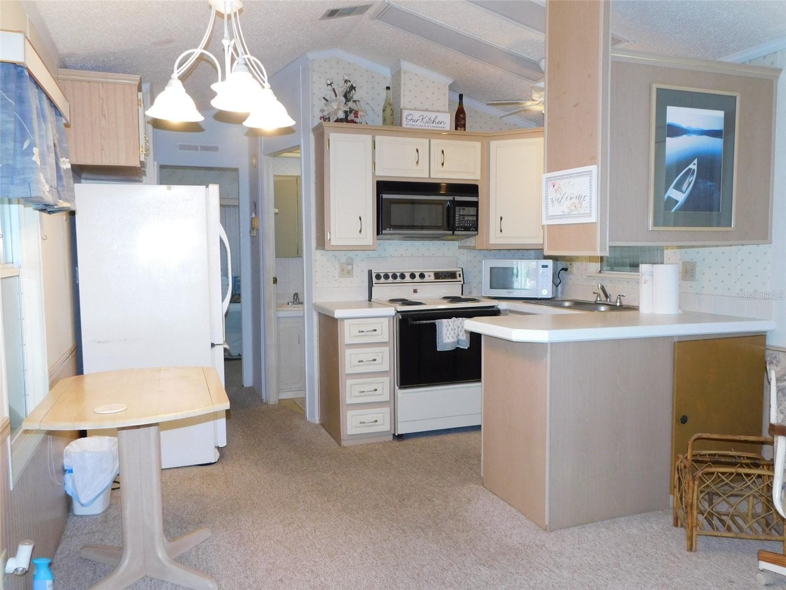 KITCHEN, DINING ROOM AREA - 7739 BLUFF BLVD #121, ZOLFO SPRINGS