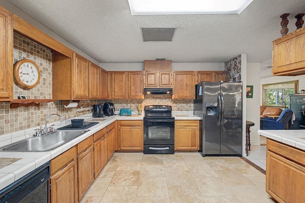 Single Family Residence at 12960 SE 114TH PL, DUNNELLON, photo 2 of 61