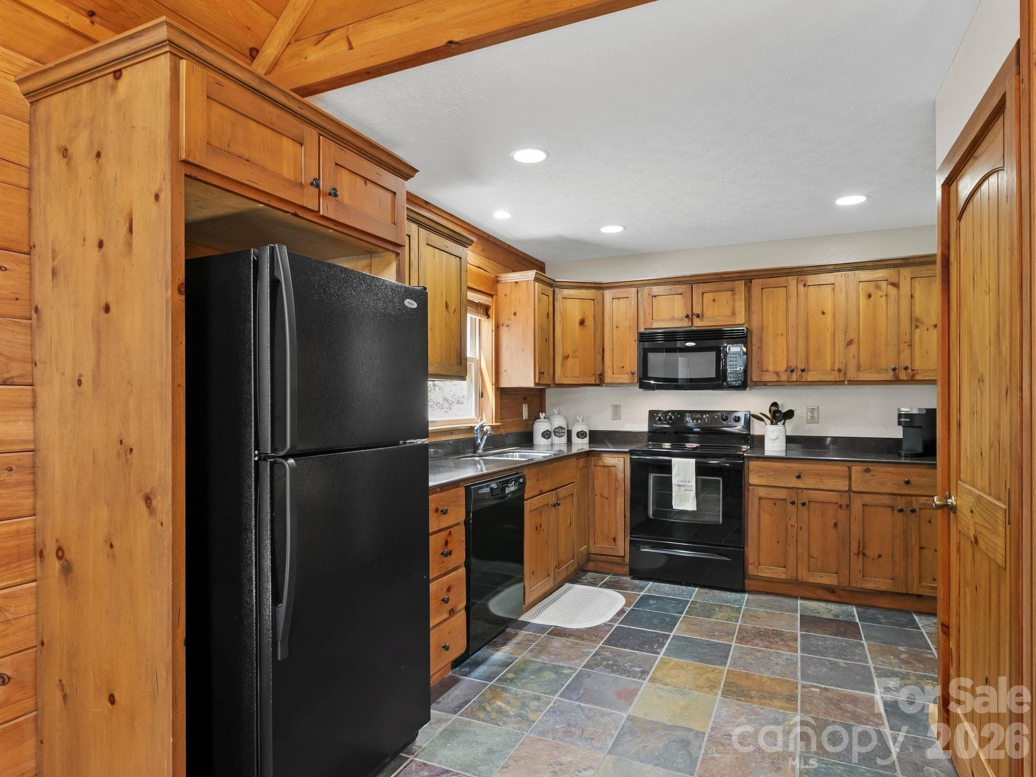 Kitchen with custom cabinets. - 72 Cottontail Trail, Maggie Valley