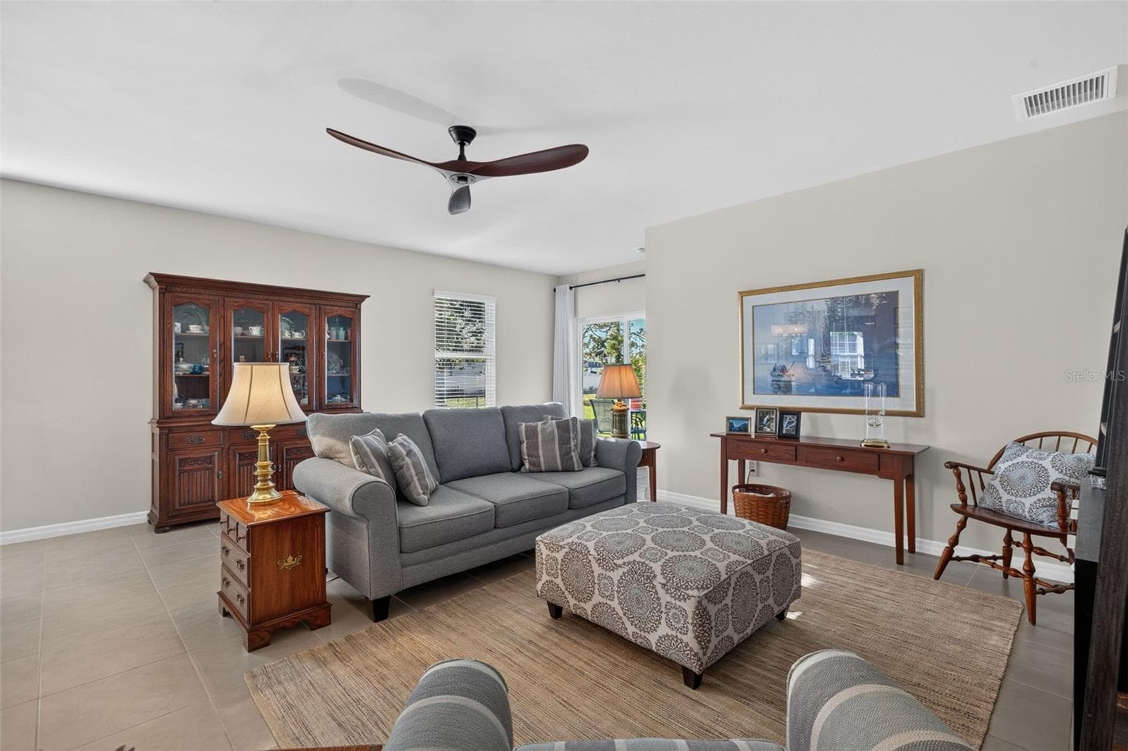 Living area with Updated Fan - 1706 NW 30TH LN, CAPE CORAL