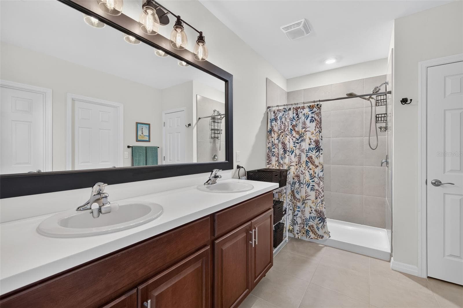 Primary Bathroom w Walk In closet and Linen Closet - 1706 NW 30TH LN, CAPE CORAL