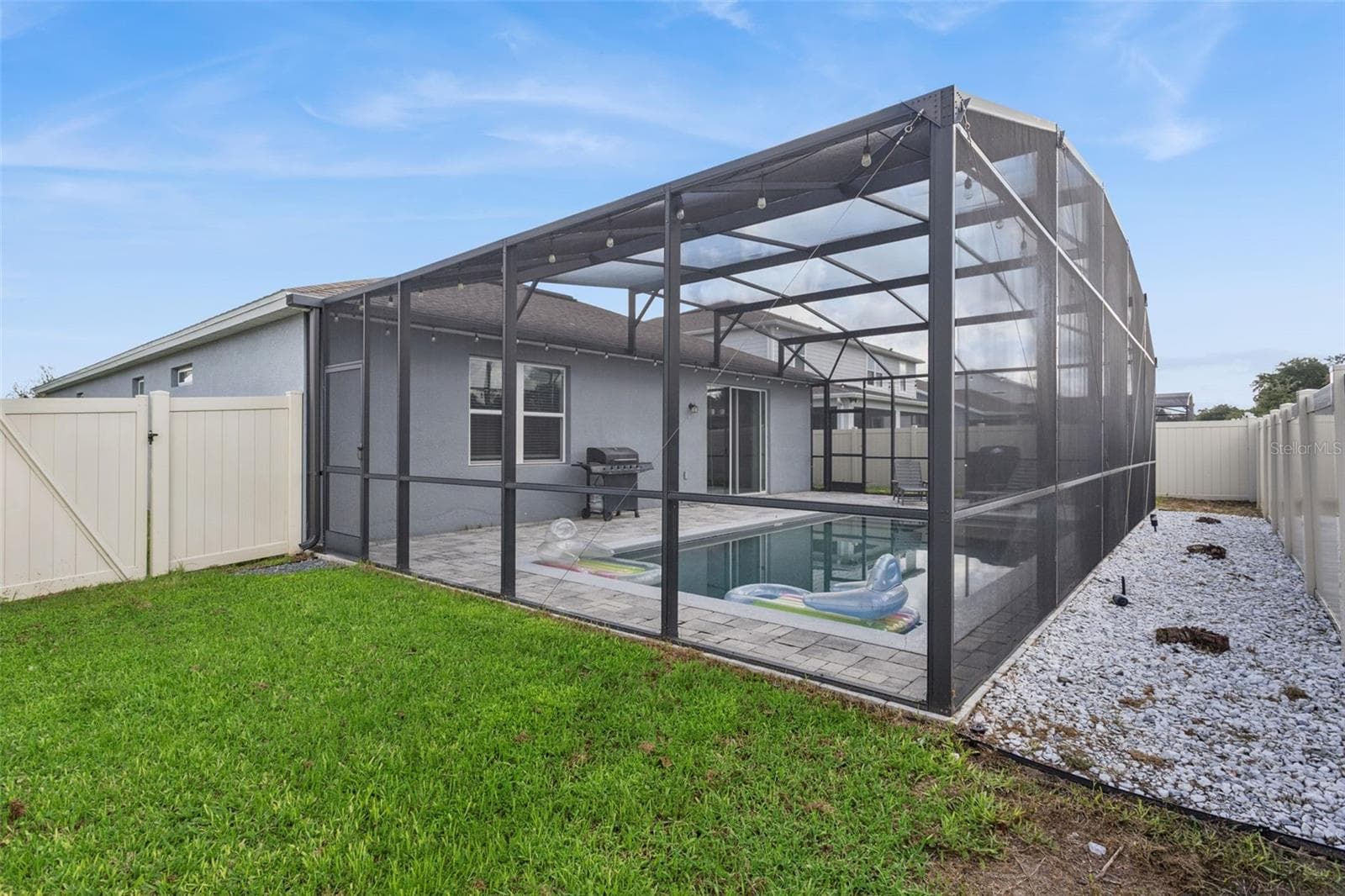 Screen-enclosed Pool Patio - backyard - 2749 HILLTOP LOOP, APOPKA