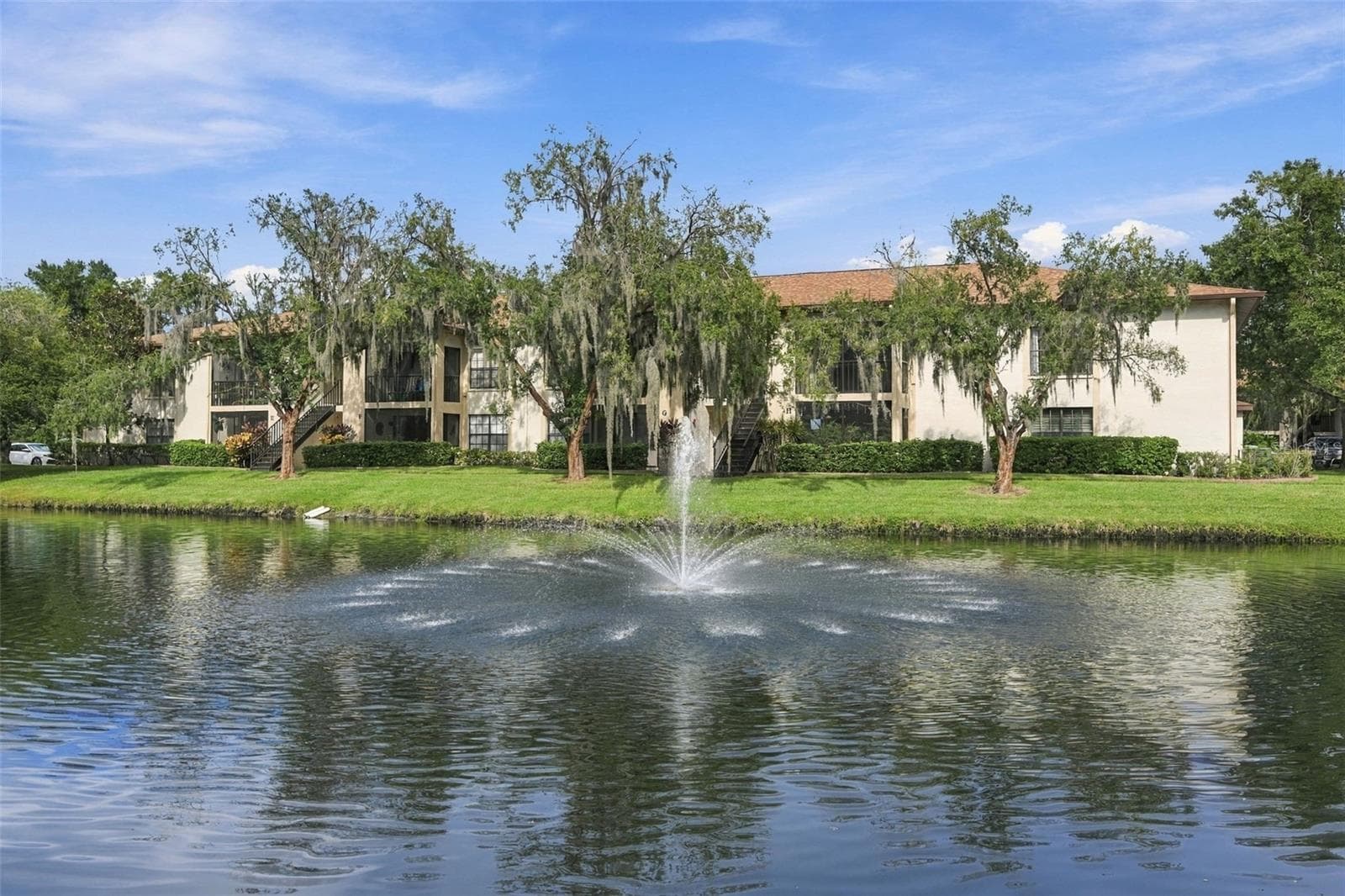 View of Water fountain from front porch - 3380 CRYSTAL CT E #P, PALM HARBOR