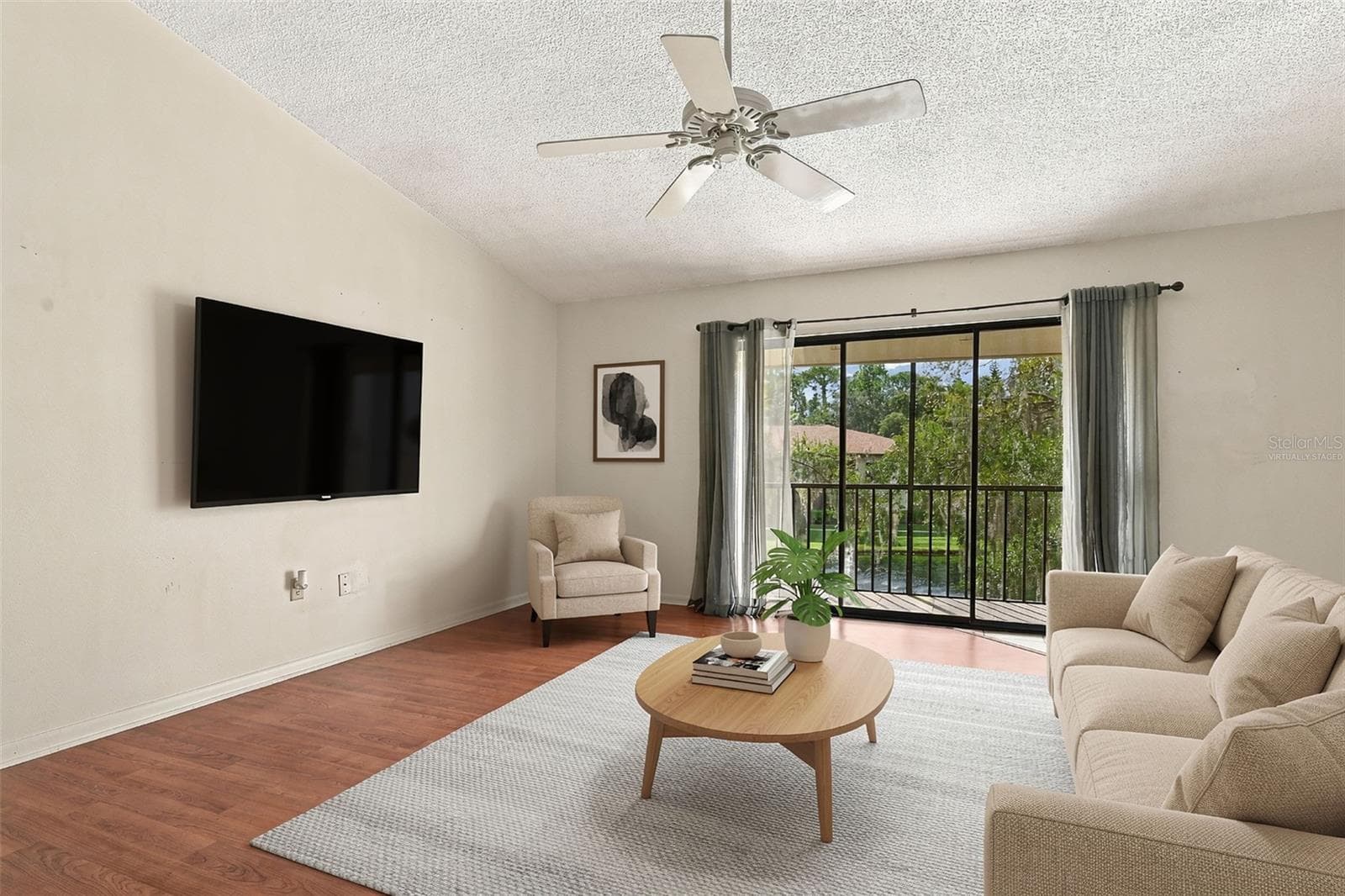 Living Room virtually staged - 3380 CRYSTAL CT E #P, PALM HARBOR