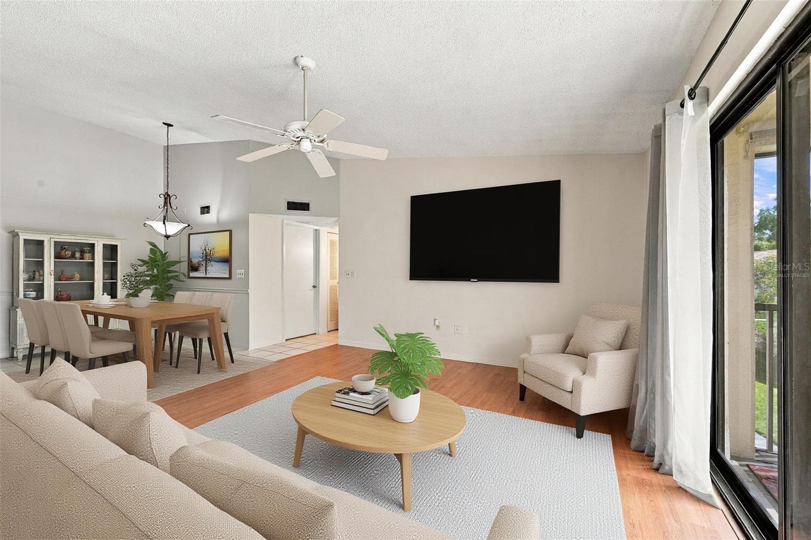 Dining area virtually staged - 3380 CRYSTAL CT E #P, PALM HARBOR