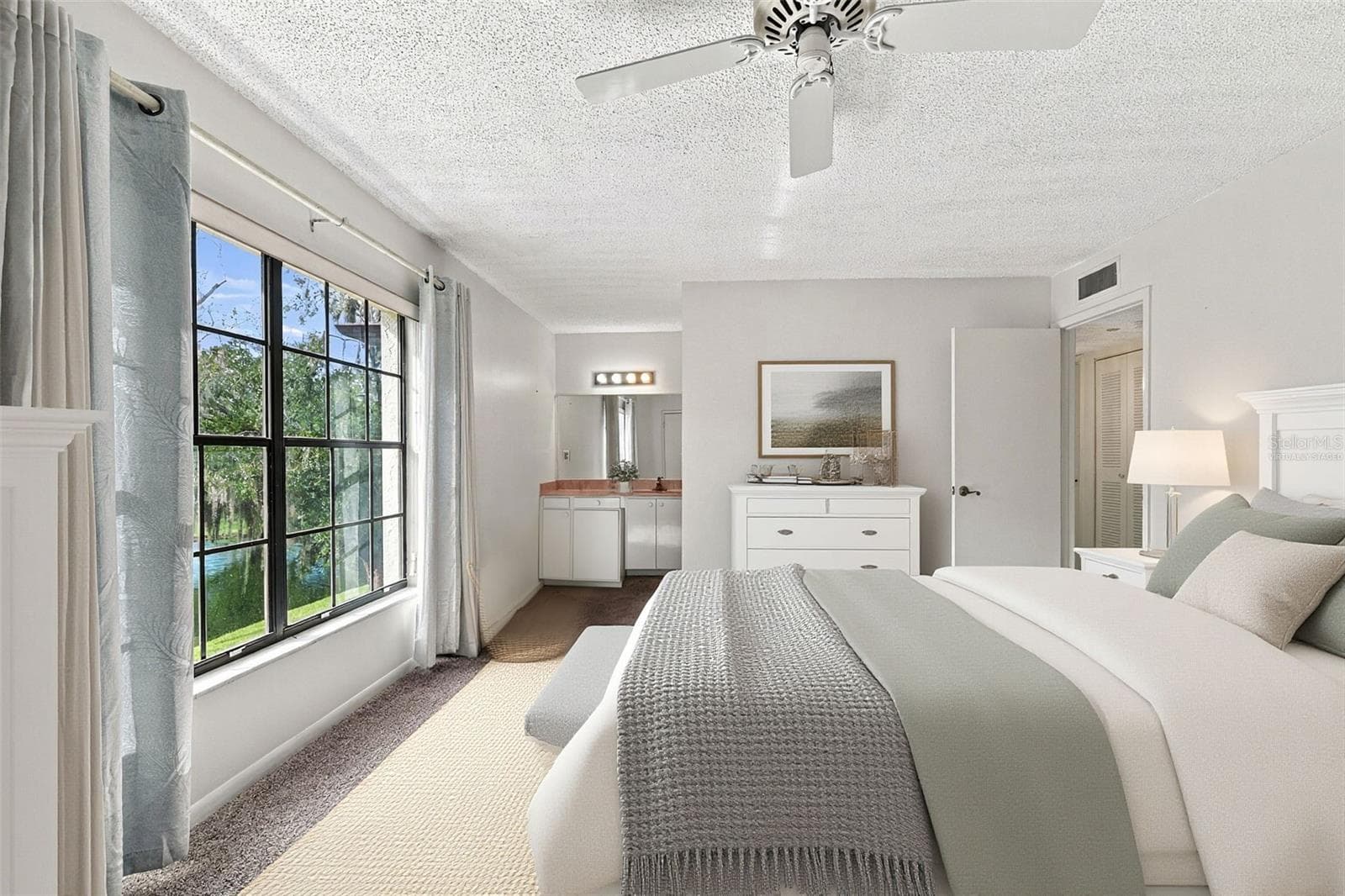 Primary bedroom virtually staged - 3380 CRYSTAL CT E #P, PALM HARBOR