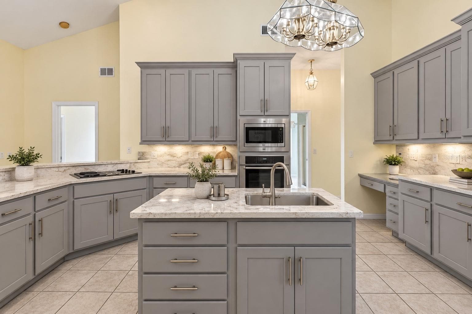 Virtually Changed to show remodel with new counters and painted existing cabinets. - 4325 FARRELL LN, ORLANDO