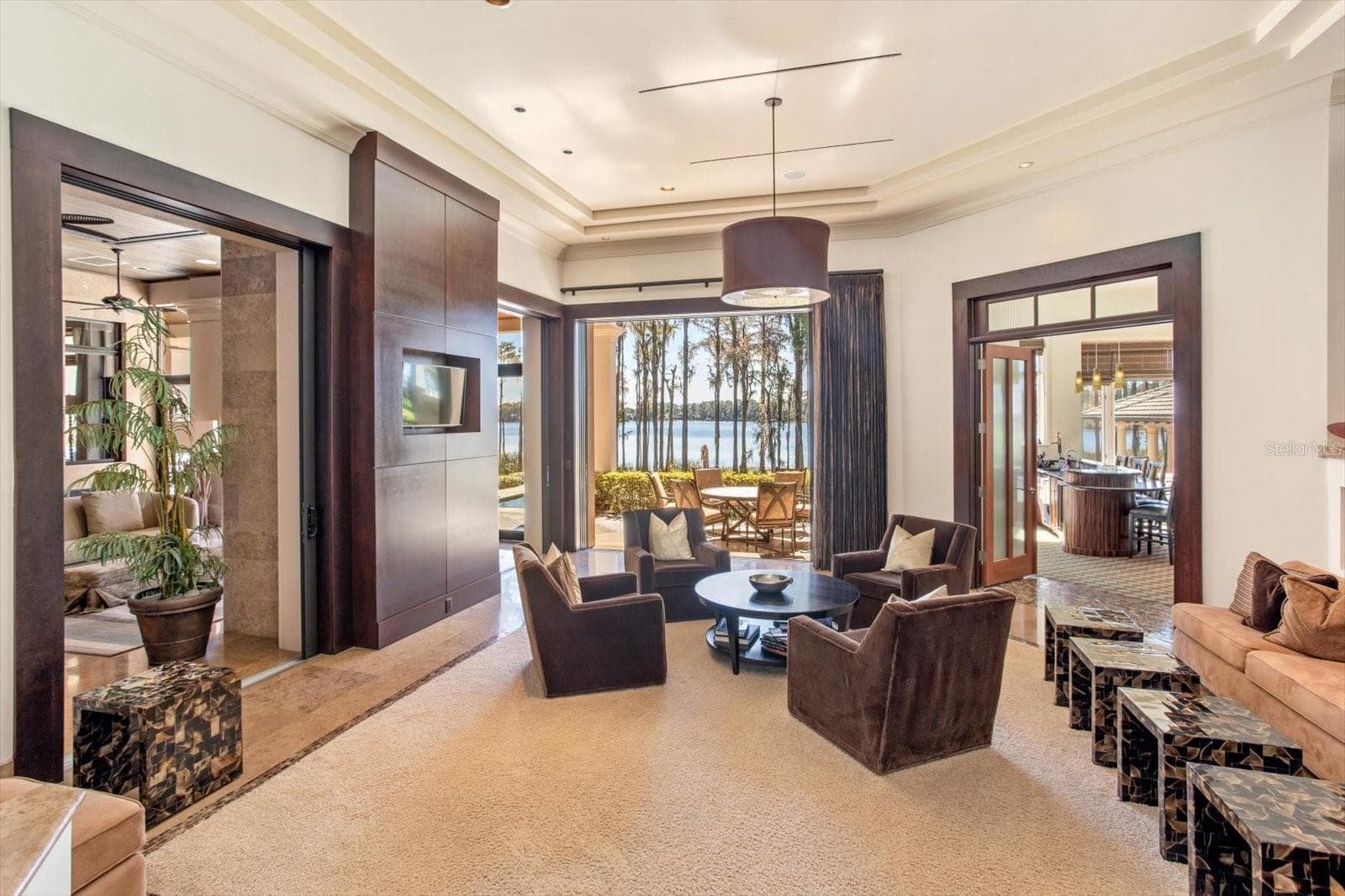 Sliding doors that open to the patio bringing the outdoors in! - 5192 VARDON DR, WINDERMERE