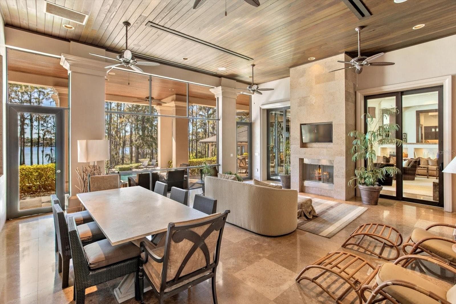 Patio family room with fireplace - 5192 VARDON DR, WINDERMERE