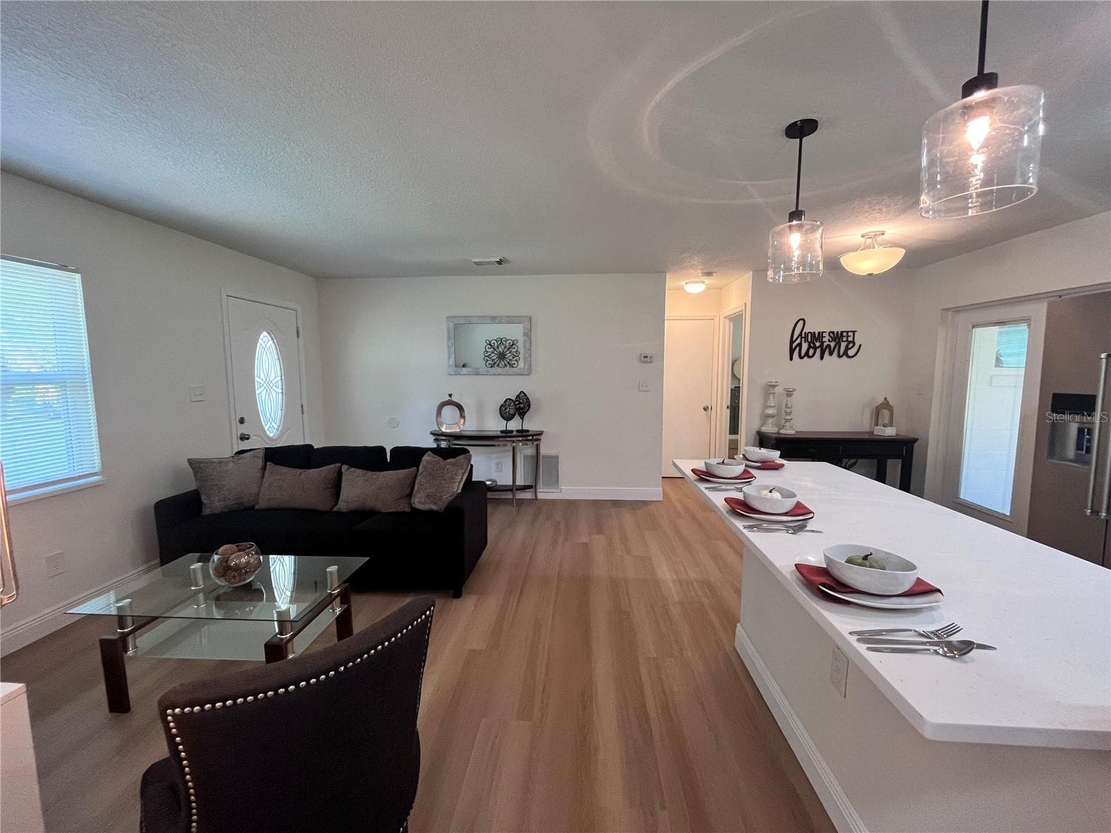 Open Livingroom/Kitchen - 7728 WHISPER PL, ORLANDO