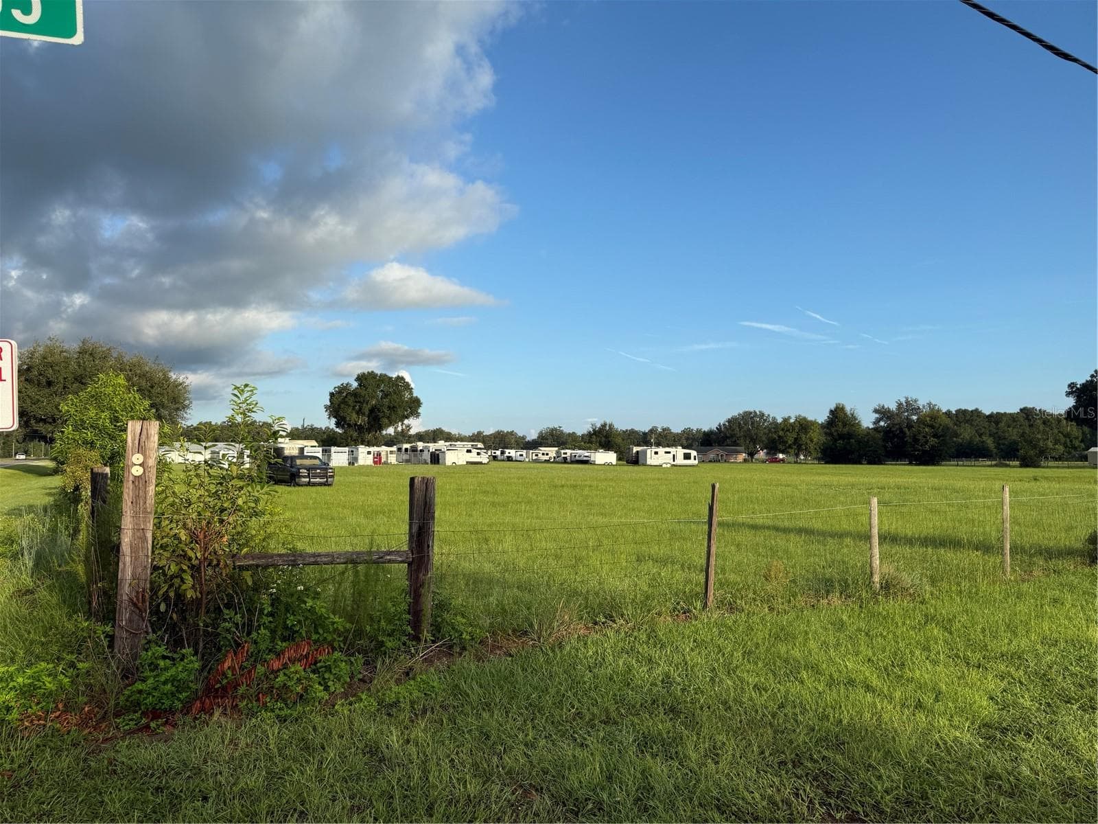 View from the corner of the land to the trailer storage area - 2262 E C-478, WEBSTER