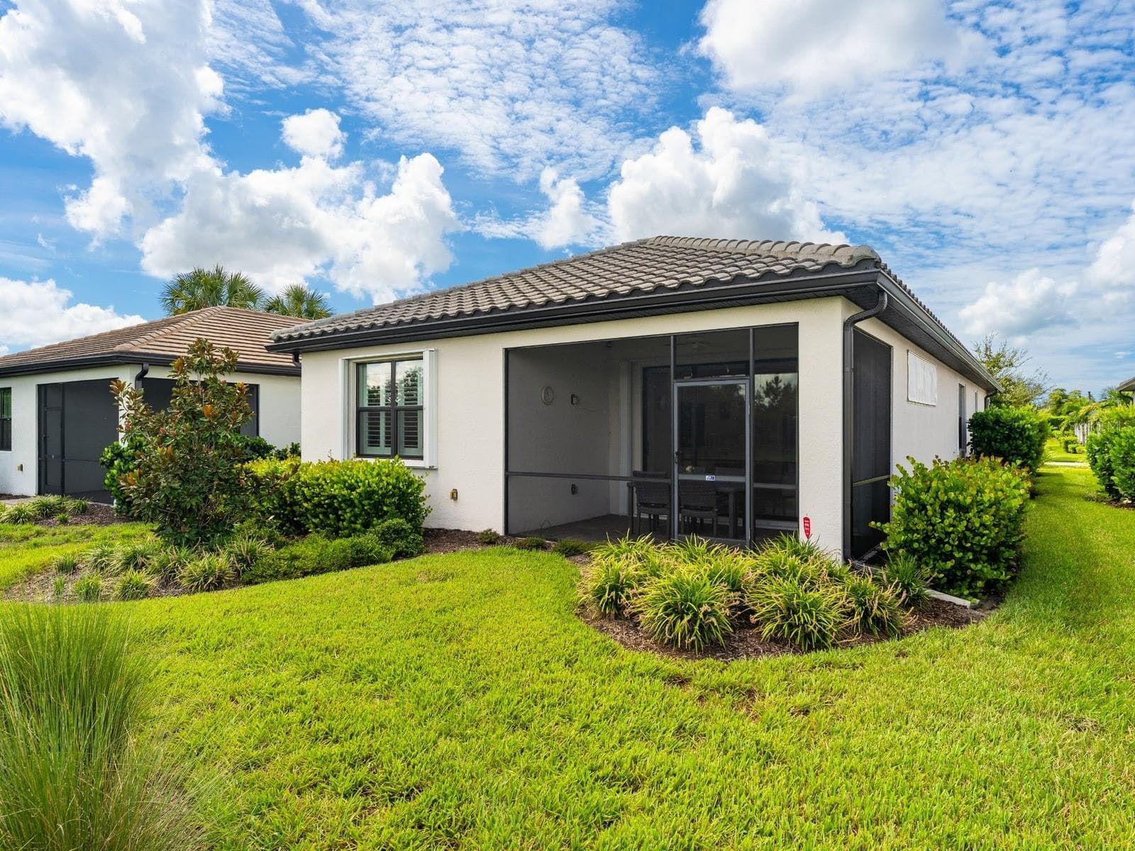 Screened lanai with private view. - 6332 WINDING PINE DR, NOKOMIS