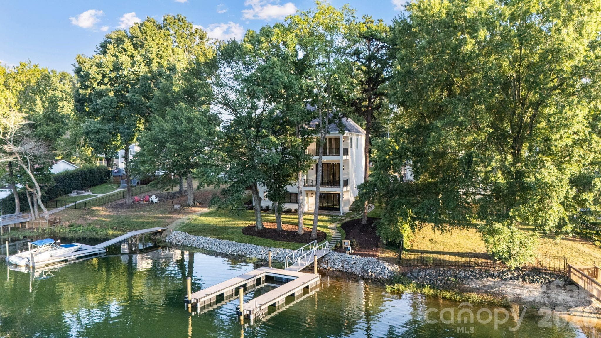 Waterfront, 3 levels of indoor/outdoor living, flat backyard ready for a pool, brand new dock!  You'll love living here. - 21216 Rio Oro Drive, Cornelius