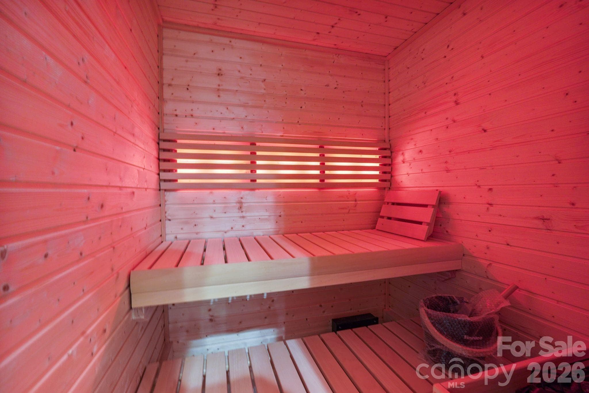 Private wellness center featuring a built-in sauna, creating a dedicated space for relaxation and recovery in the comfort of home. - 21216 Rio Oro Drive, Cornelius