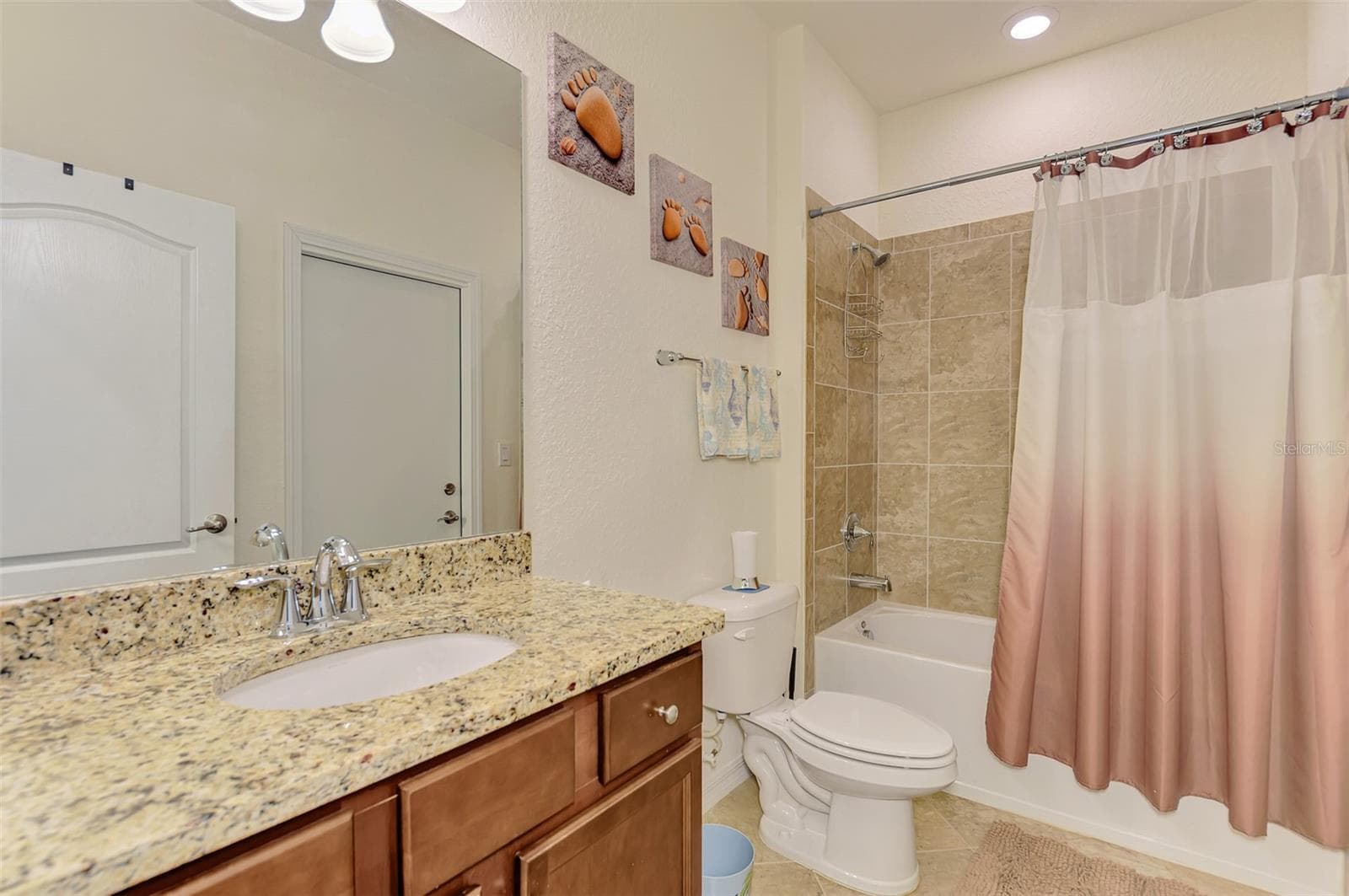 Guest Bath-Leads to lanai. - 9845 HILLTOP DR, VENICE