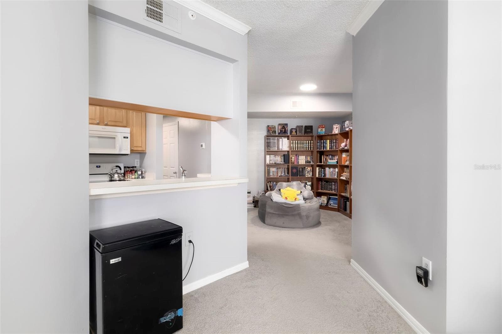 Living Area to Kitchen. - 5500 BENTGRASS DR #6-203, SARASOTA