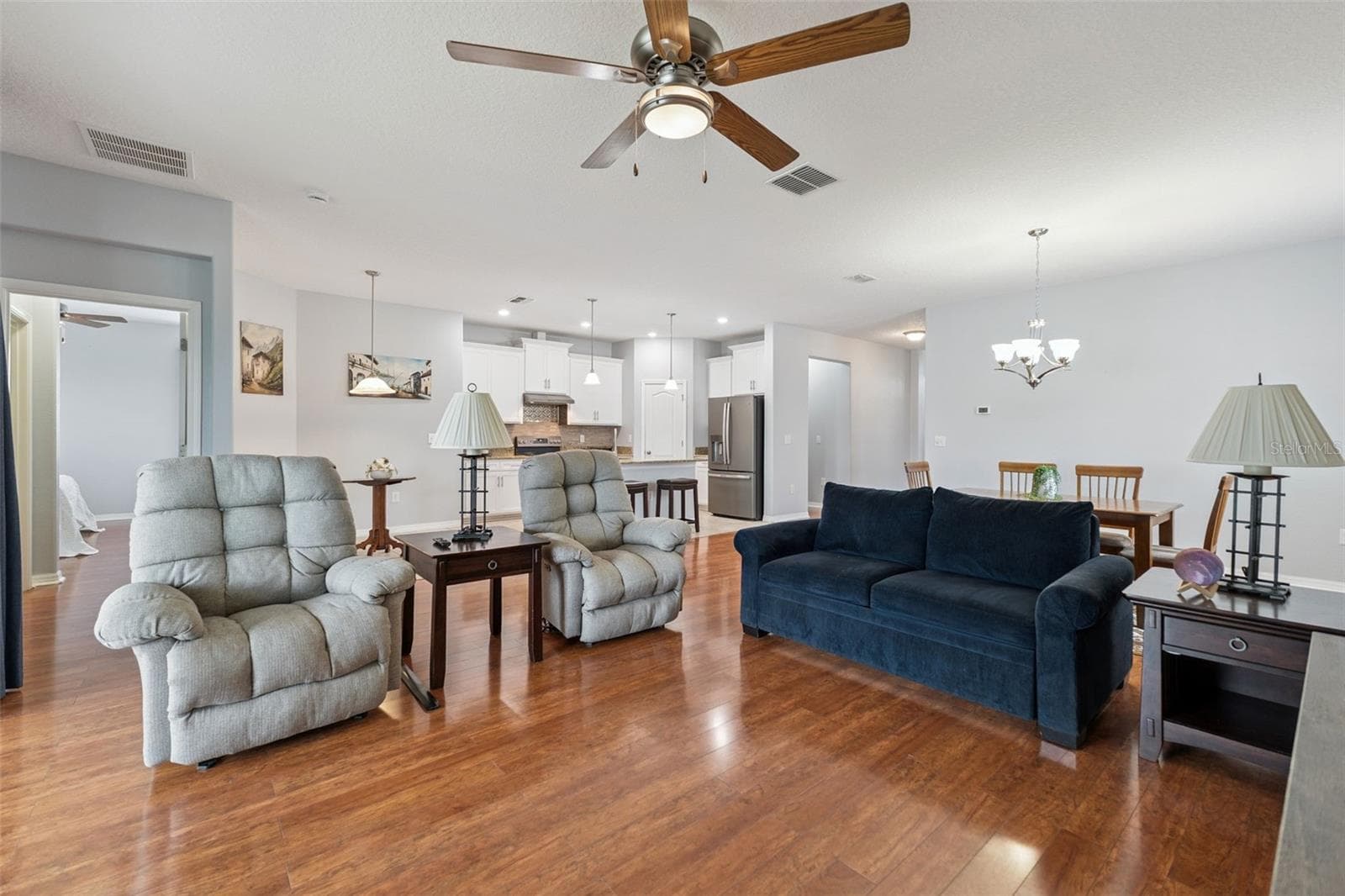 Wood Laminate Flooring throughout the main living areas - 3541 RALEIGH DR, WINTER HAVEN