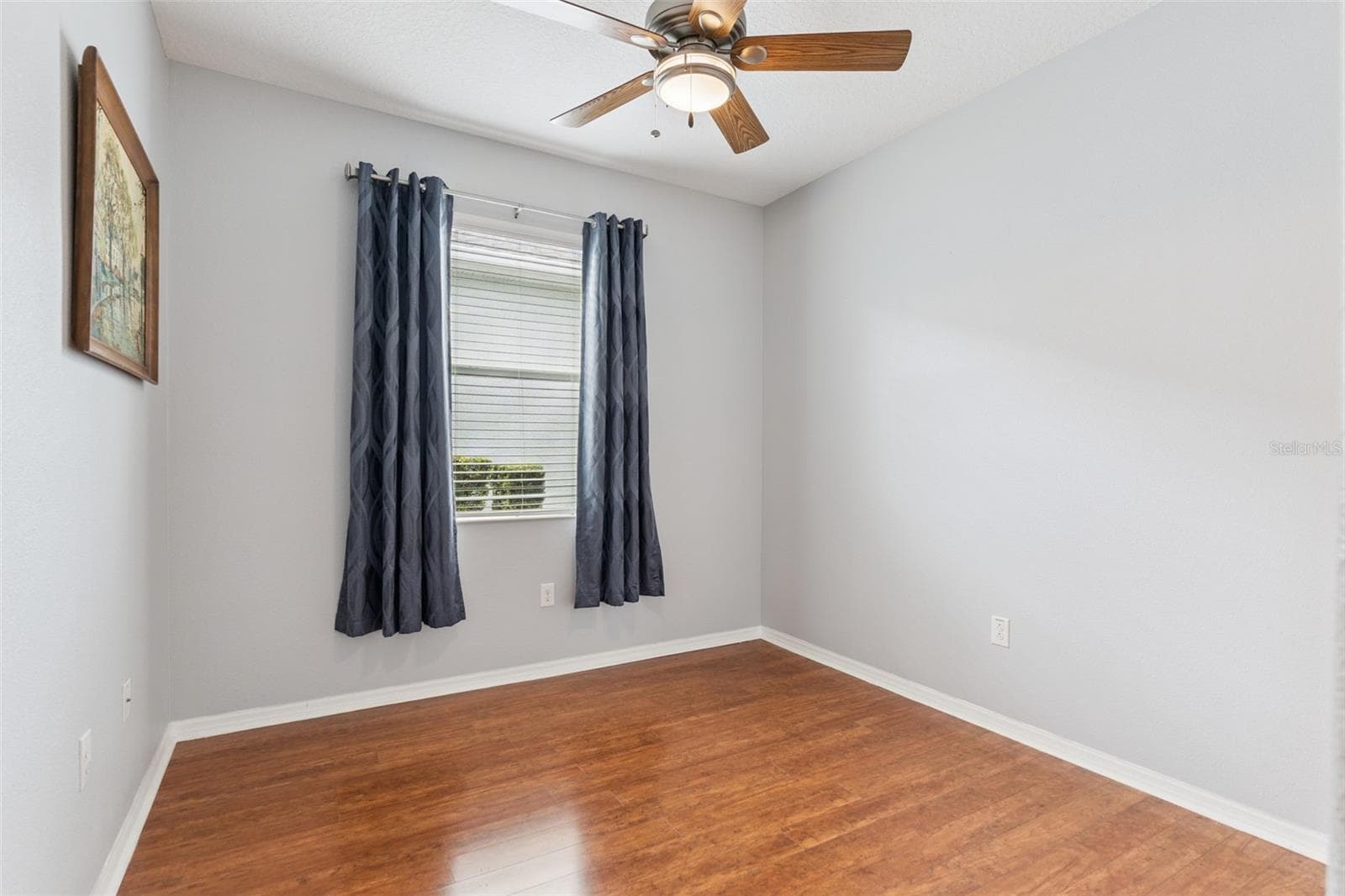 Junior Bedroom Suite with upgraded ceiling fan that includes a remote - 3541 RALEIGH DR, WINTER HAVEN