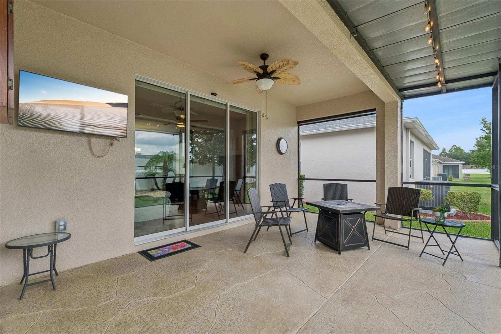 Extended Screened lanai features decorative stamped concrete flooring - 3541 RALEIGH DR, WINTER HAVEN