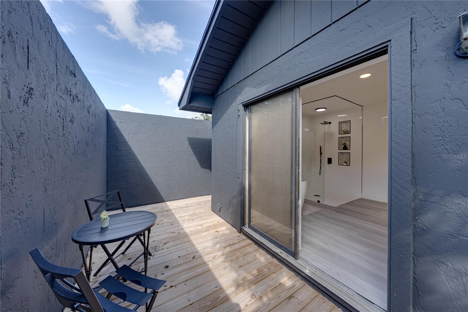 Patio off of primary suite - 6745 ENGLELAKE DR, LAKELAND