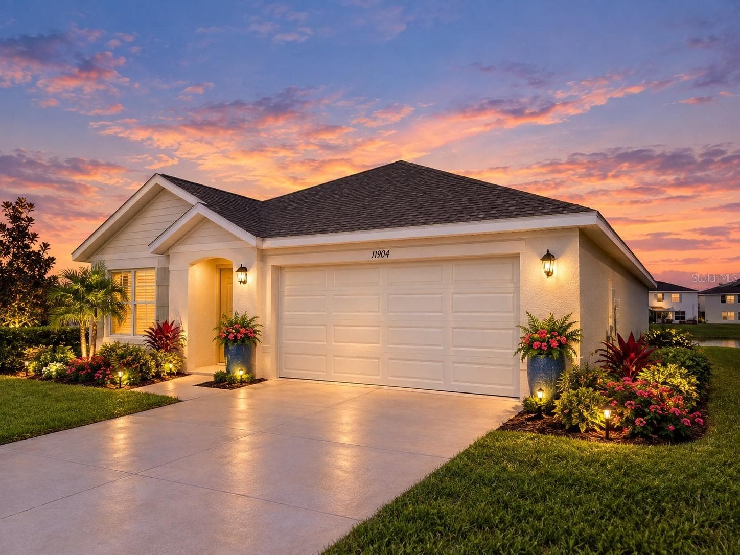 front view twilight - 11904 MOUNTAIN ISLAND TRL, PARRISH