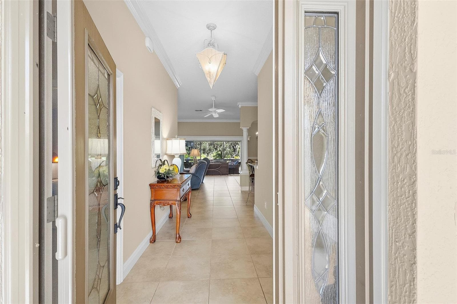 front entry hall - leaded glass front door - 1757 PENNECAMP DR, THE VILLAGES