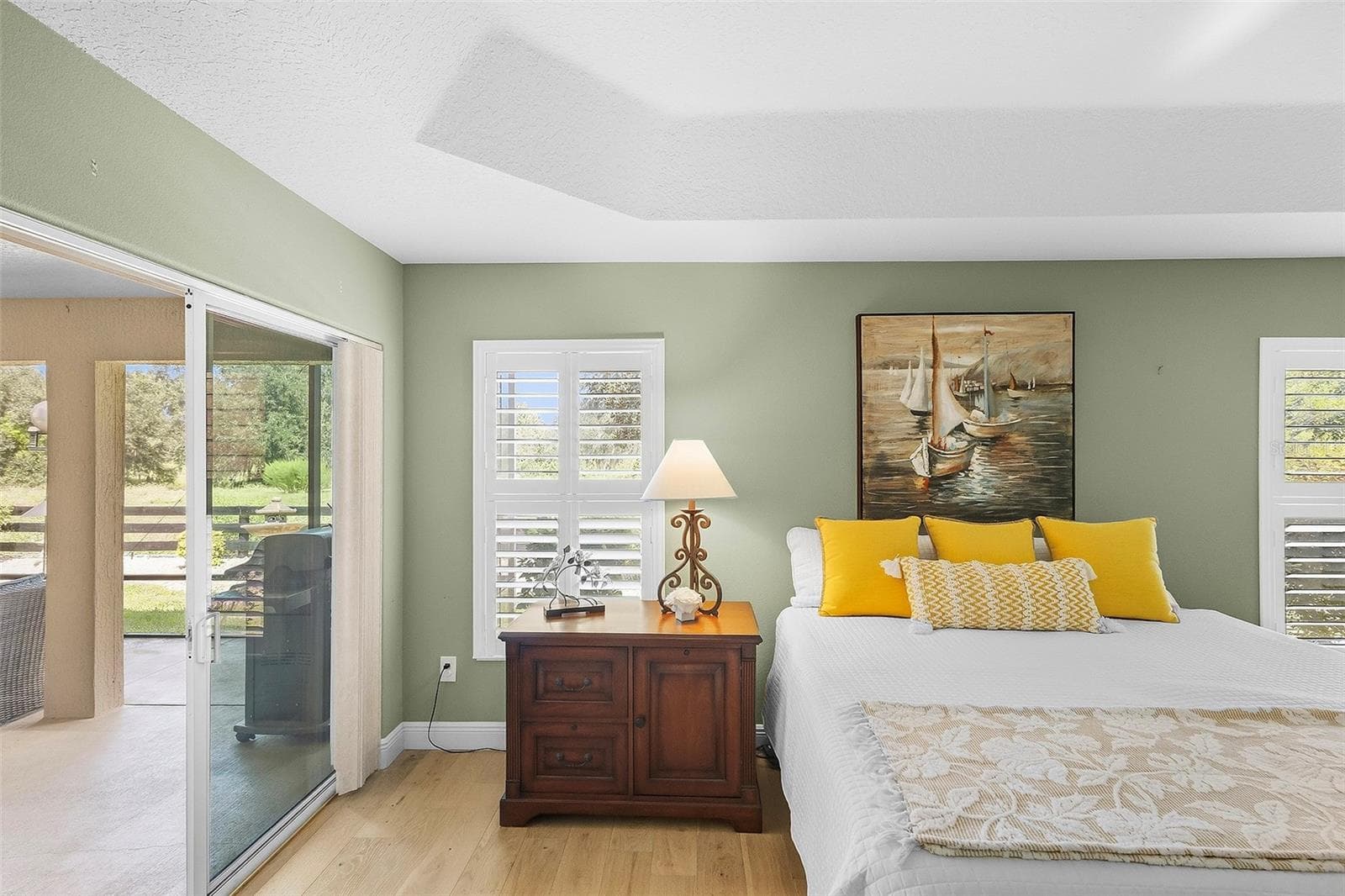 primary bedroom private access to lanai - 1757 PENNECAMP DR, THE VILLAGES