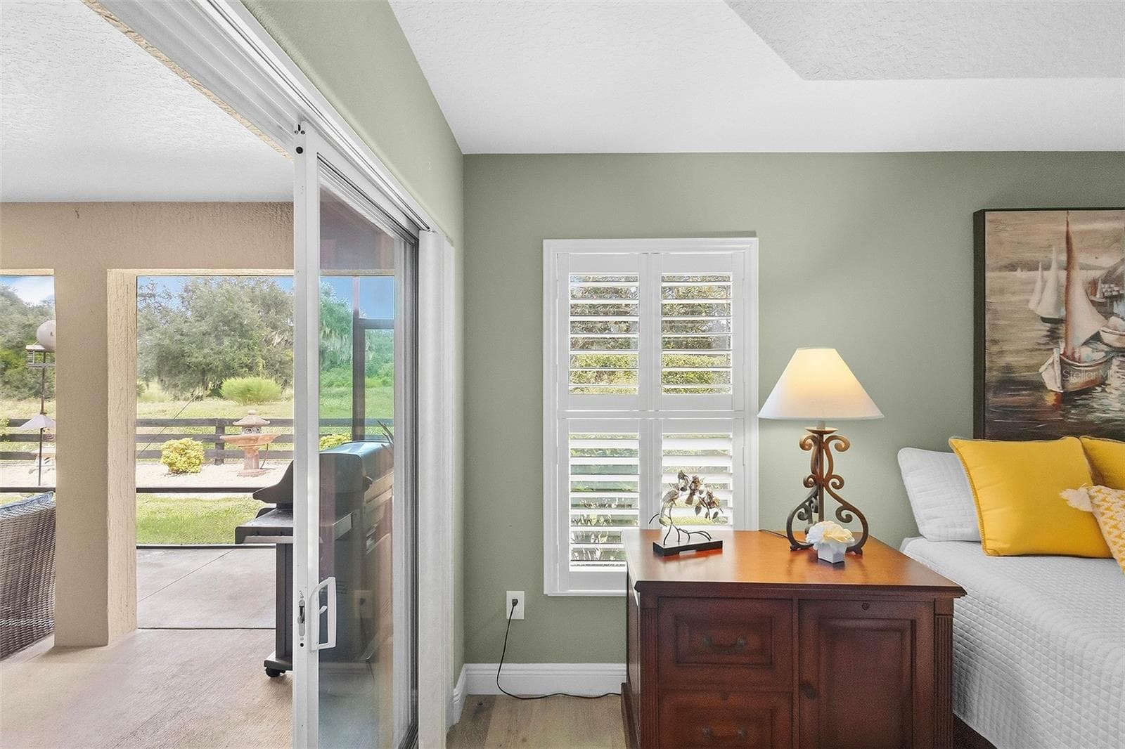 primary bedroom private access to lanai - 1757 PENNECAMP DR, THE VILLAGES