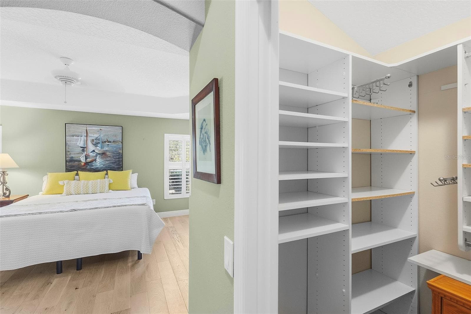 primary custom closet 1 - 1757 PENNECAMP DR, THE VILLAGES