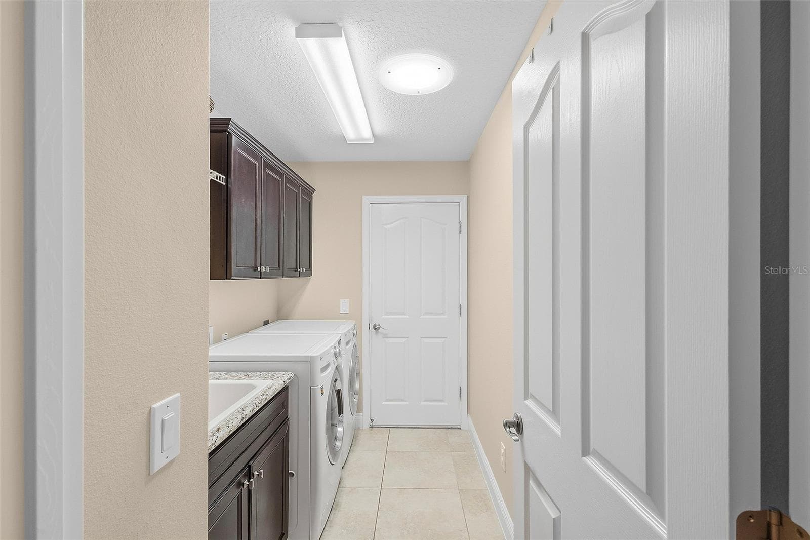 laundry room - 1757 PENNECAMP DR, THE VILLAGES