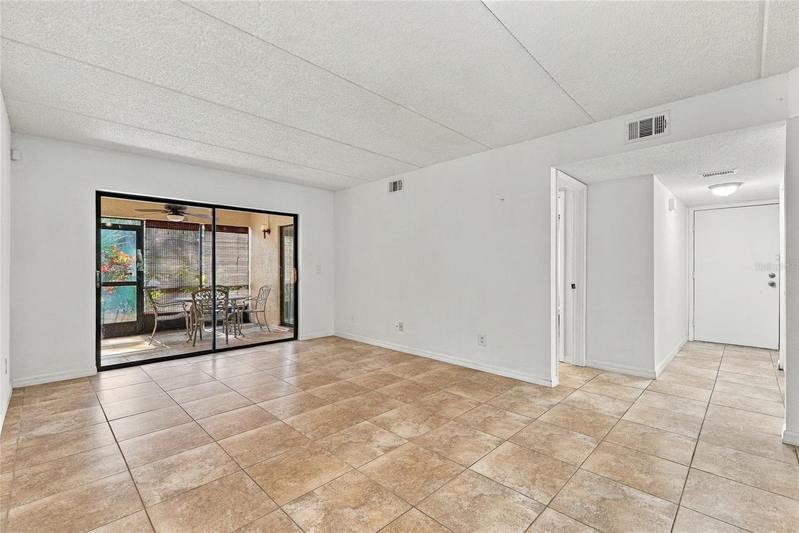 Living Room and Hallway - 131 WOODLAKE WYNDE, OLDSMAR
