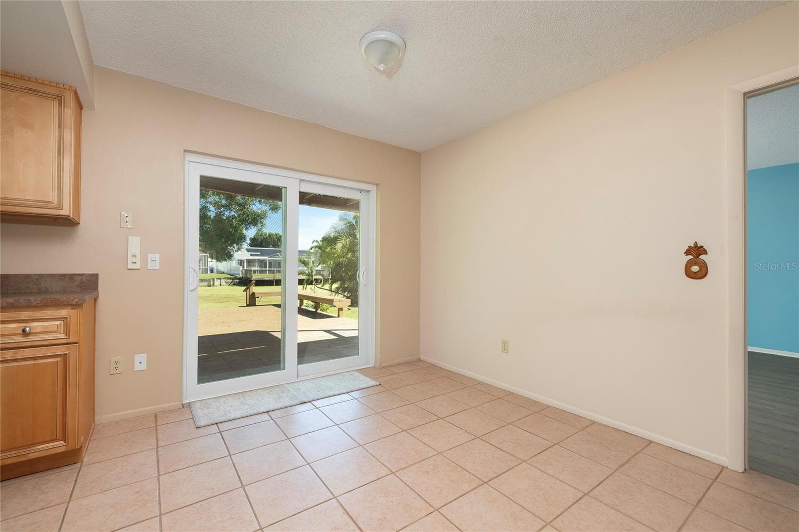 Dining Space overlooking the peaceful water - 6355 102ND TER N, PINELLAS PARK