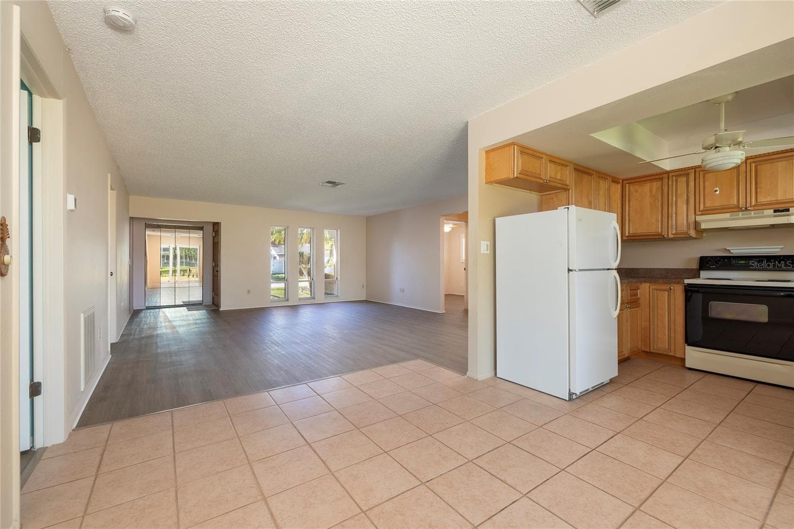 Dining Room overlooking Living Room - 6355 102ND TER N, PINELLAS PARK