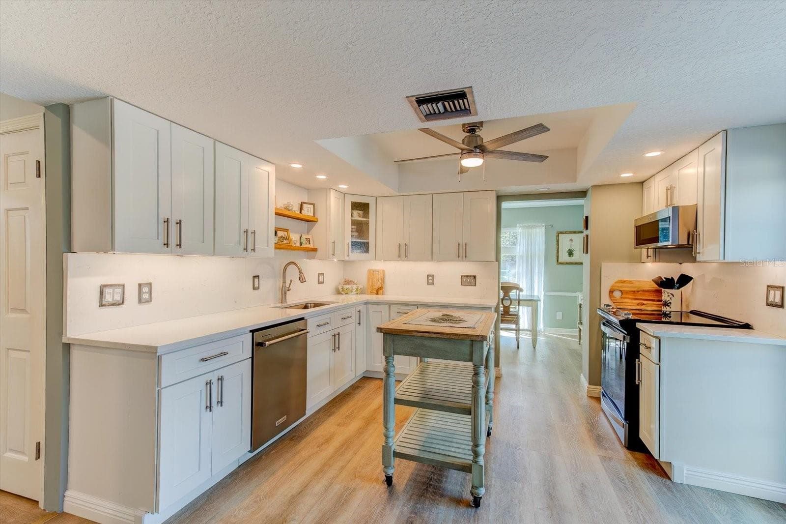 Remodeled Kitchen with abundant cabinetry and stainless steel appliances - 116 PARTRIDGE CIR, WINTER SPRINGS