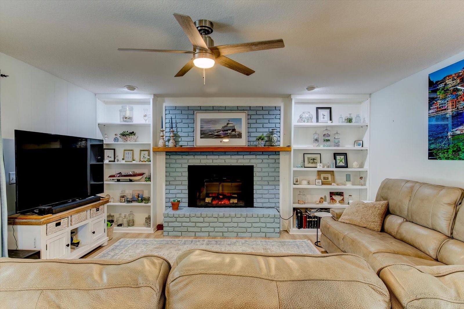 Inviting Family Room with fireplace - 116 PARTRIDGE CIR, WINTER SPRINGS