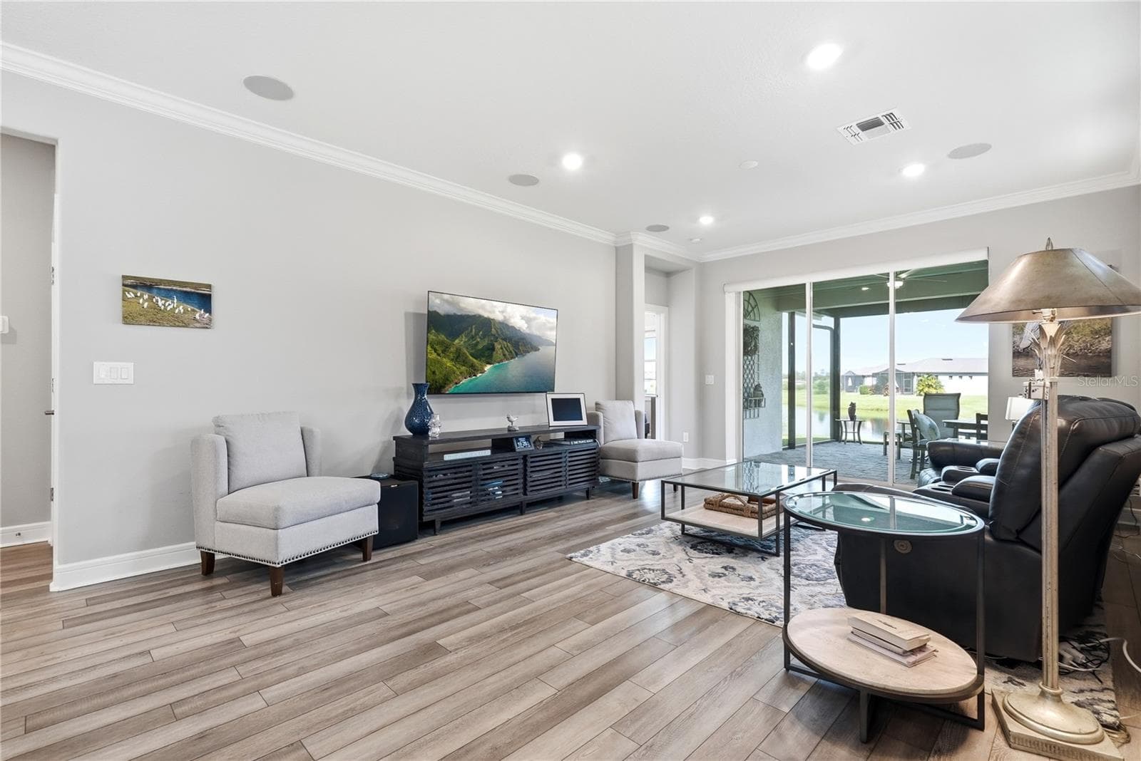 Living Room is equipped with surround sound. - 5535 BLUE CRUSH BND, LAND O LAKES