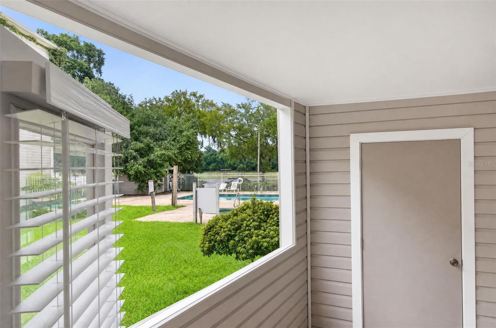 View of Pool Area from the unit - 4000 SW 23RD ST #2-105, GAINESVILLE
