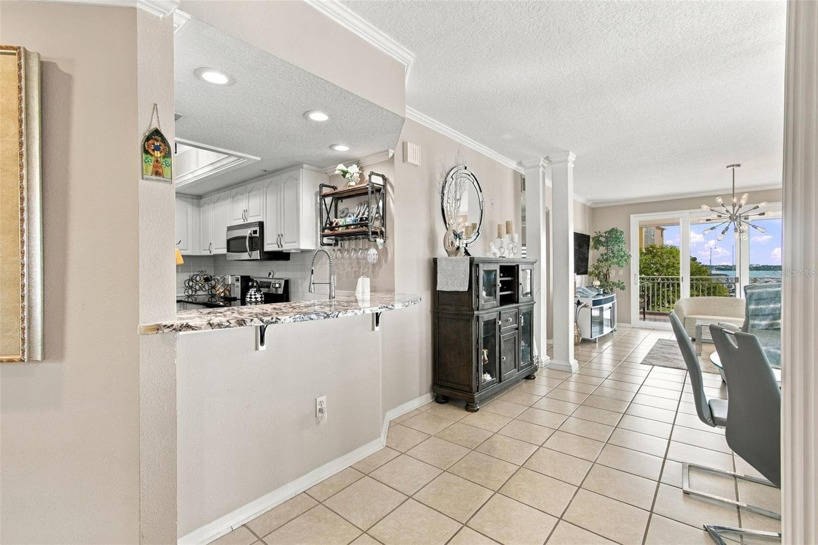 Entry area to dining room - 399 150TH AVE #205, MADEIRA BEACH