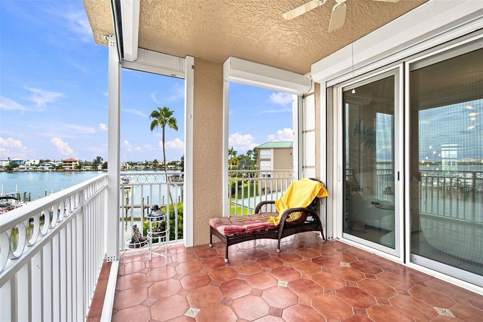 Hurricane shutters on High Impact sliding glass doors - 399 150TH AVE #205, MADEIRA BEACH