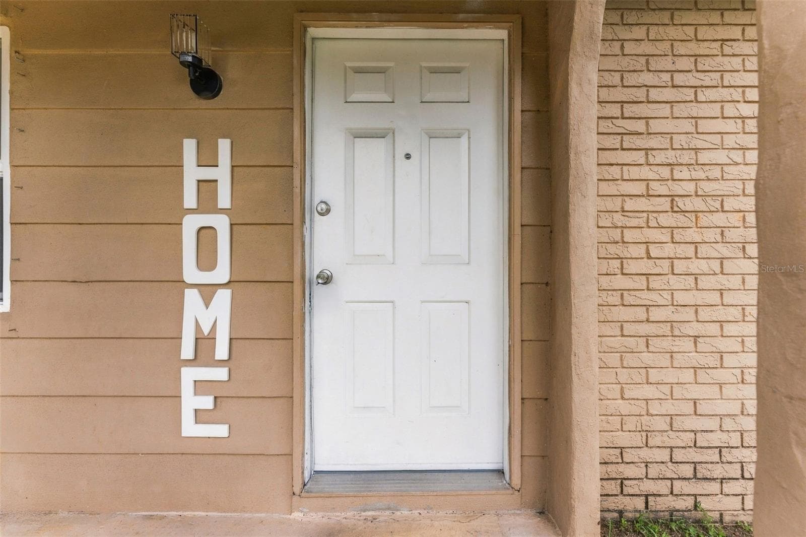Inviting Covered Front Entry - 7303 RIVERBANK DR, NEW PORT RICHEY