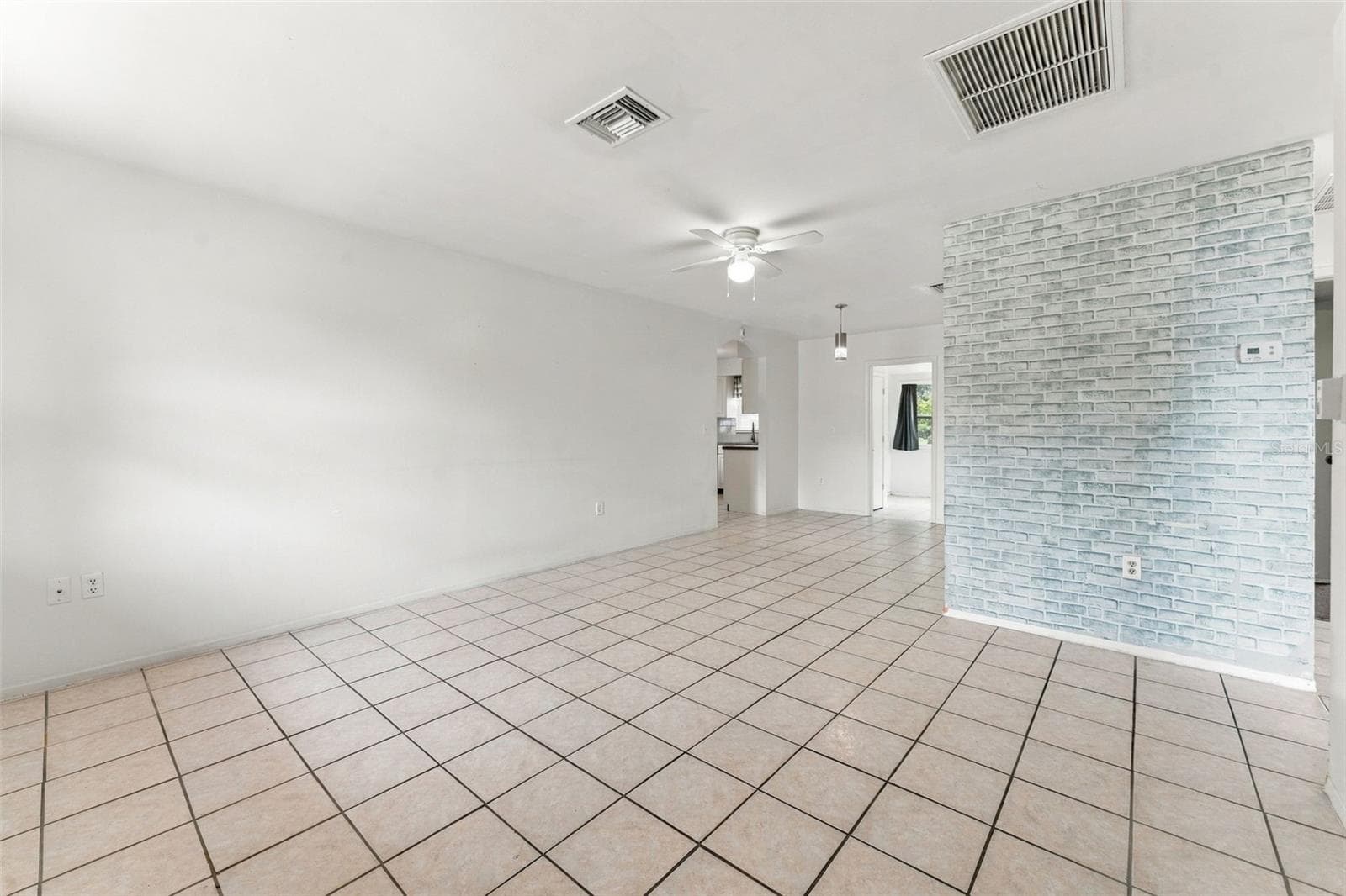 Light-Filled Living Room - 7303 RIVERBANK DR, NEW PORT RICHEY